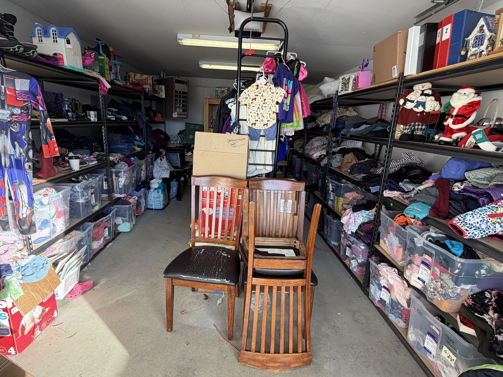 Shelves of community goods at the free store, the work donations support. No people shown.